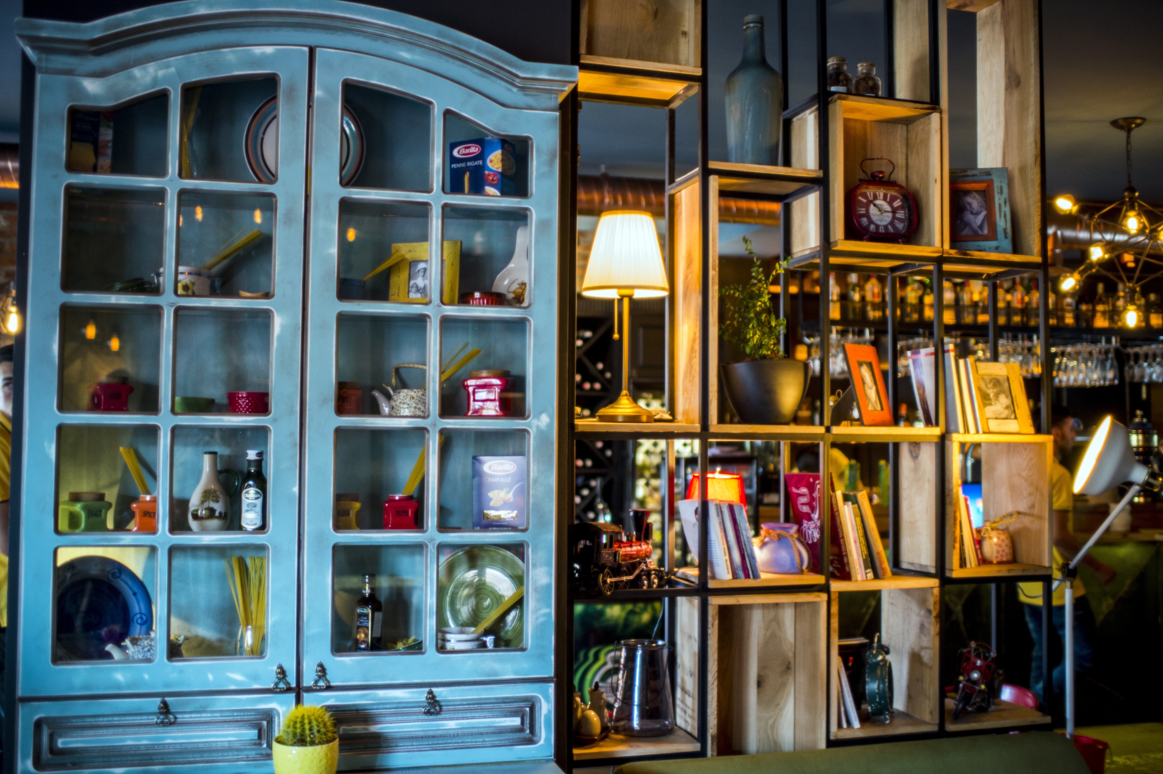 items and knick-knacks in a blue display cabinet and box shelf